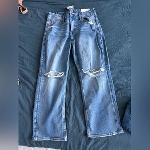 Distressed Blue Jeans